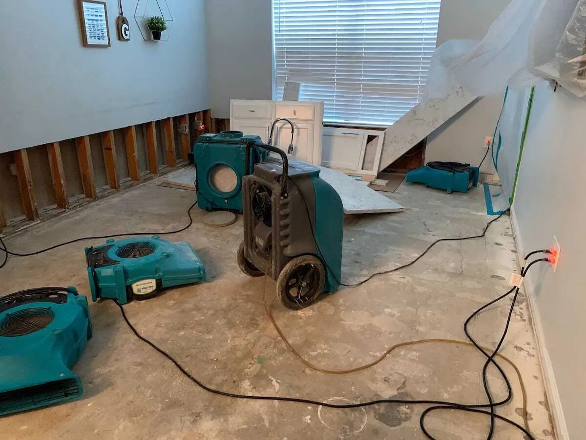 Dehumidifier in flood-cut room for Water Damage Restoration in North Madison
